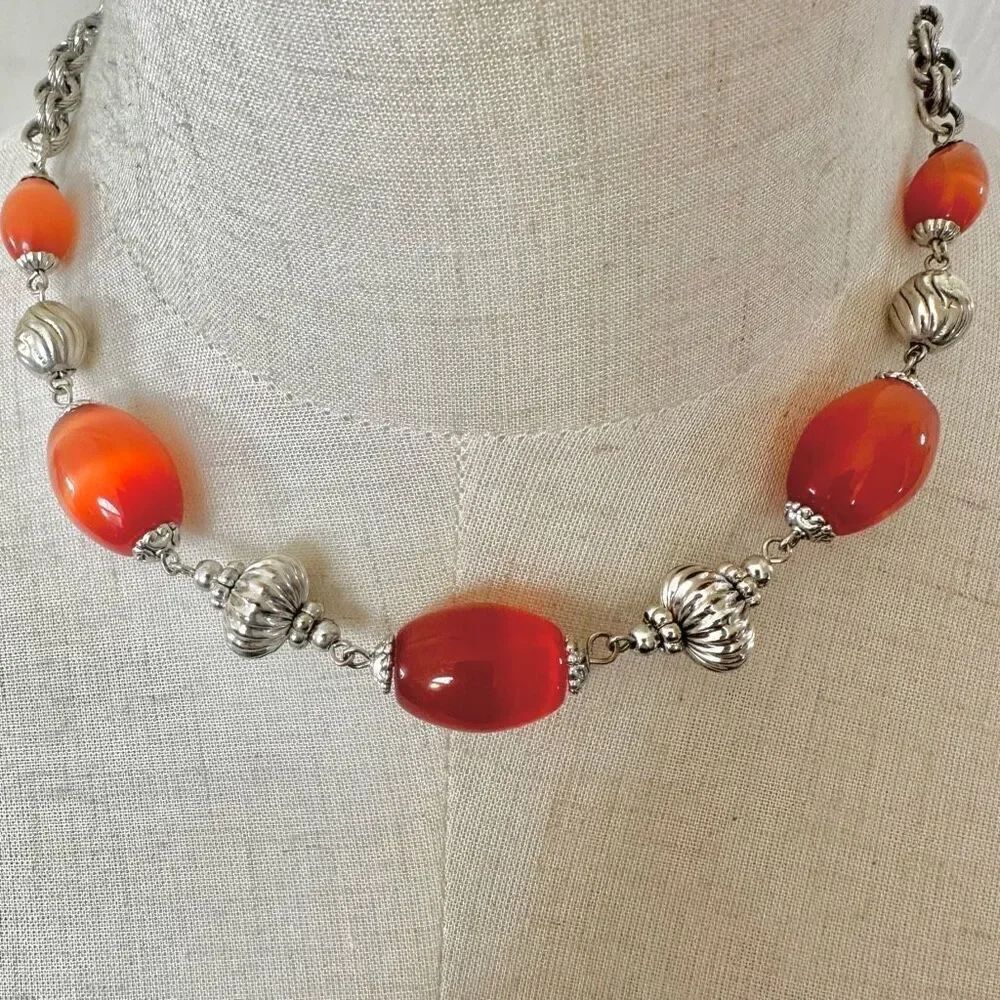 Silver tone and orange beaded necklace